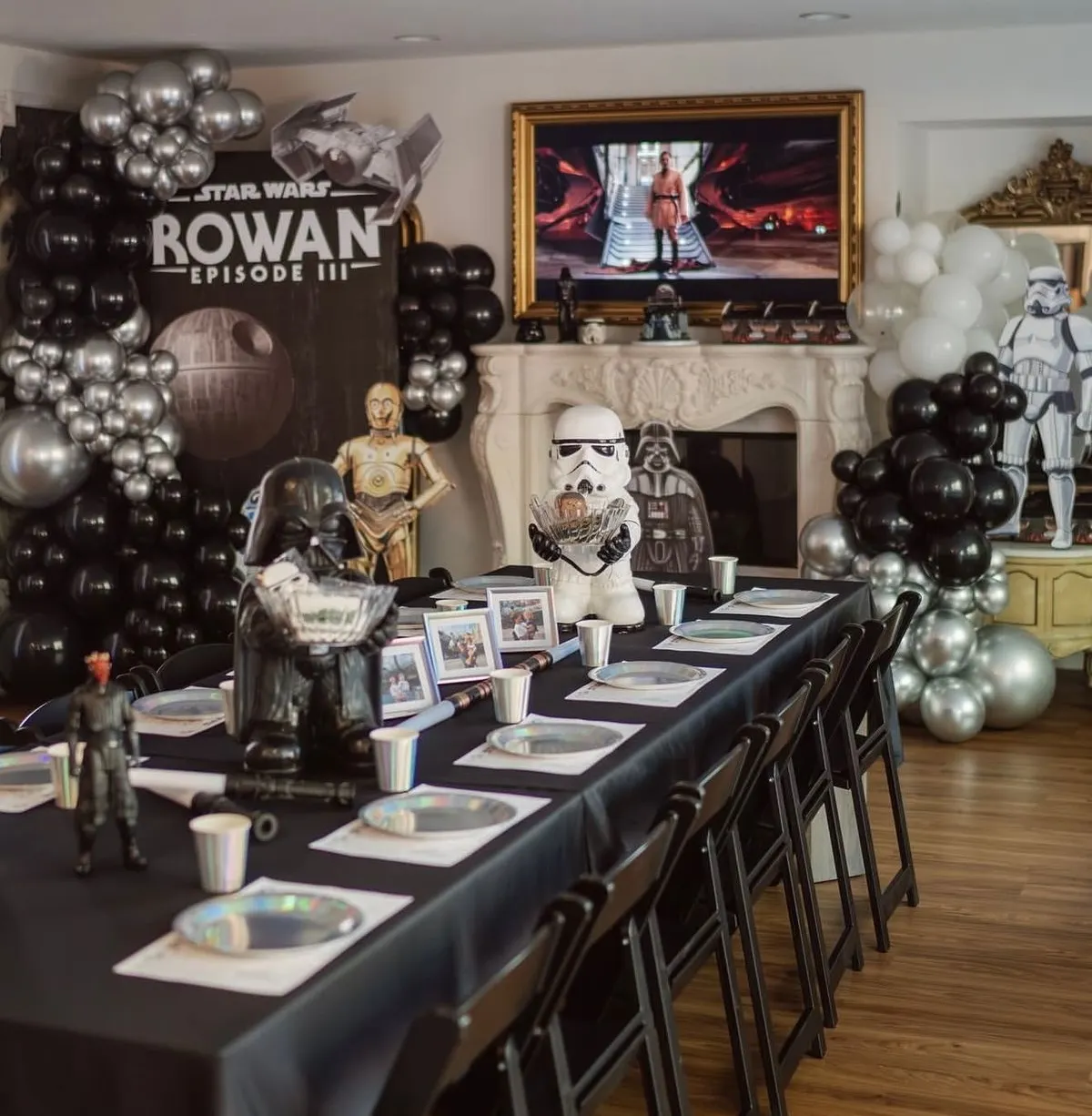 Modern Star Wars birthday decor for teens with sleek black and gold details